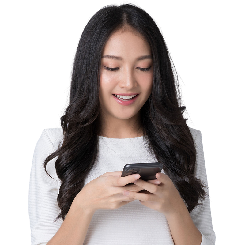 woman holding phone and smiling