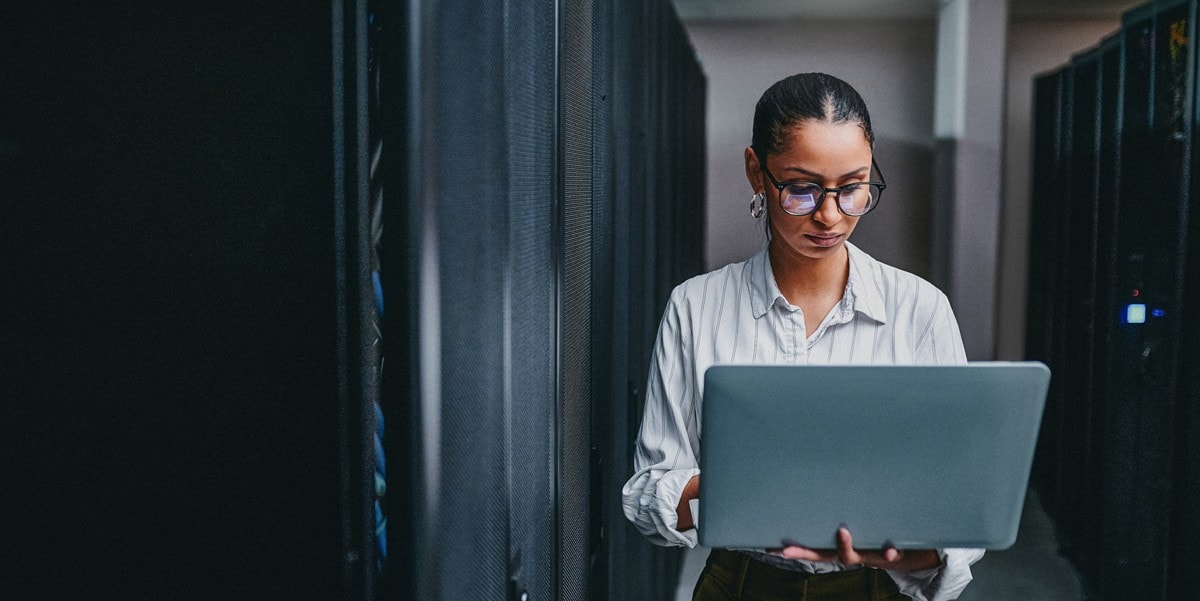 woman looking at laptop