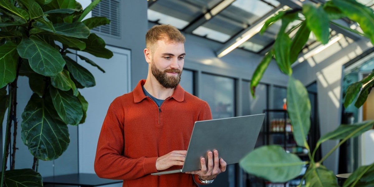 professional man holding a laptop