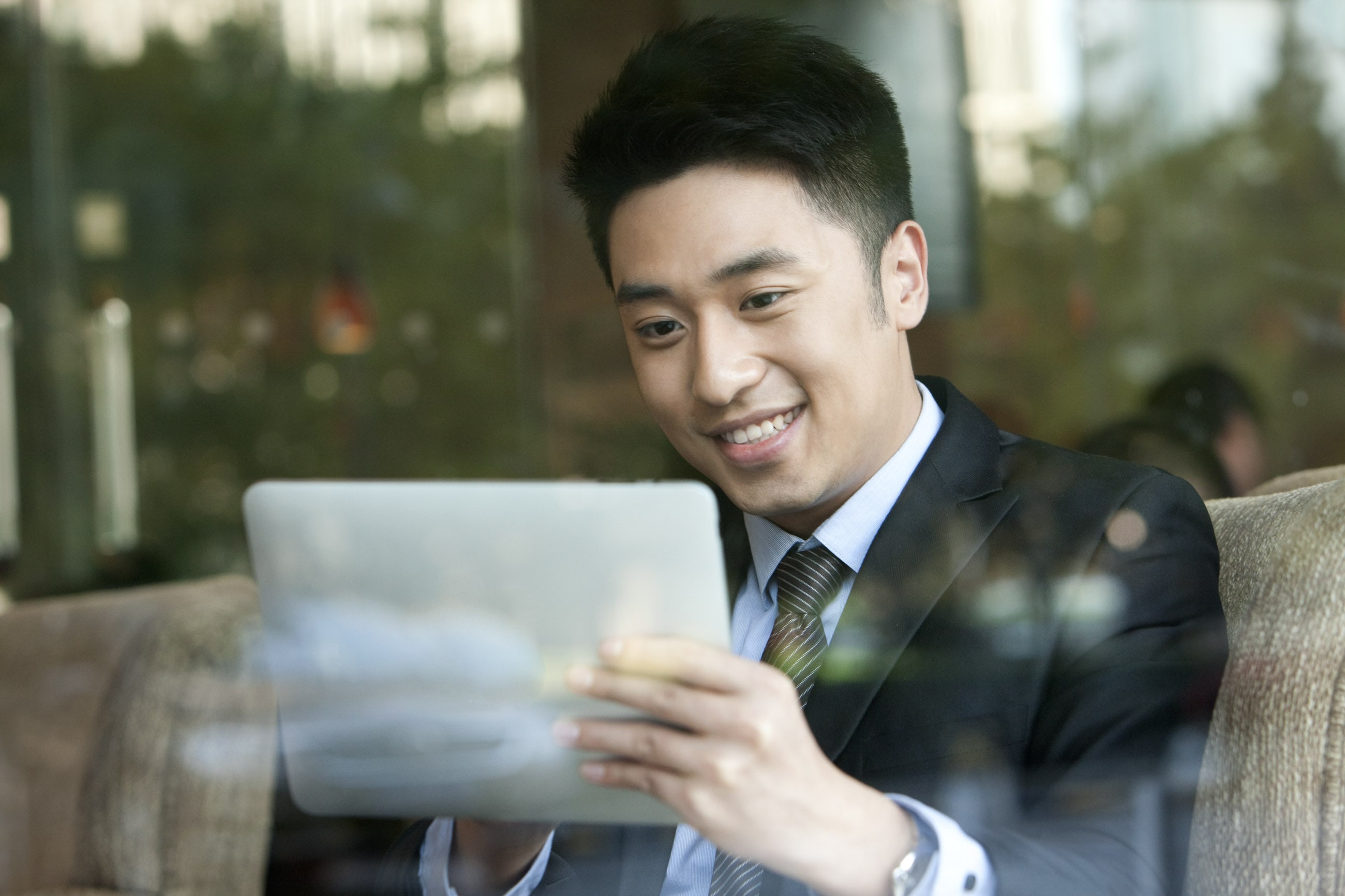 man on ipad