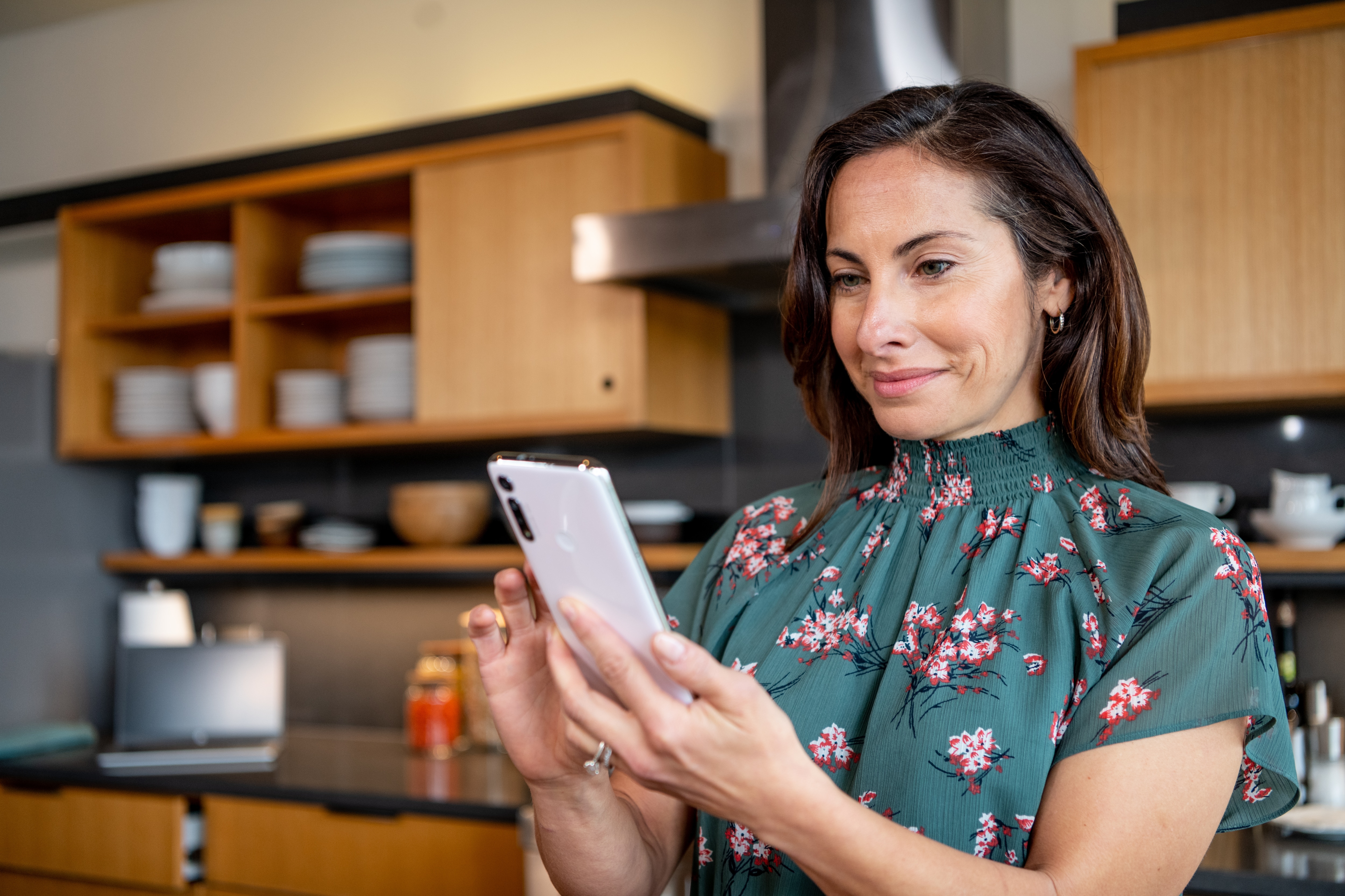 woman looking at phone