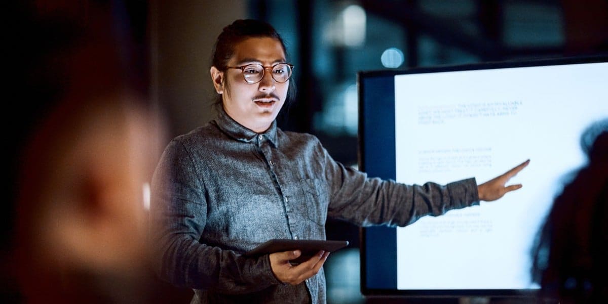 professional man in office presenting