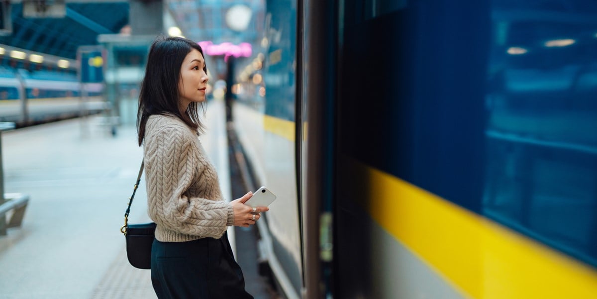 woman traveler about to board a train