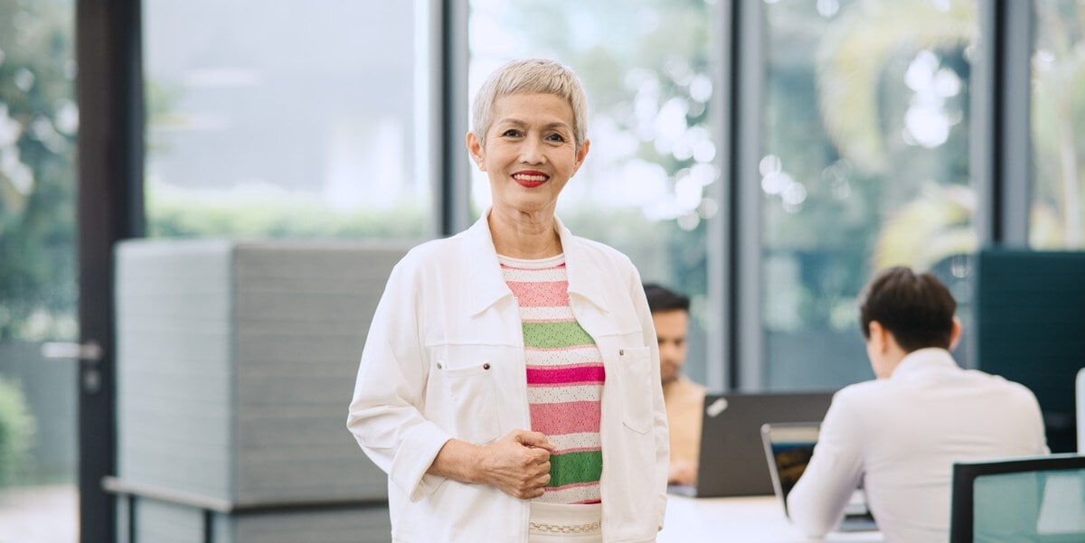 professional woman in the office smiling