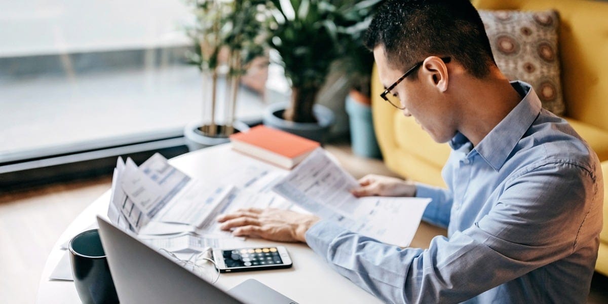 business man looking at paperwork