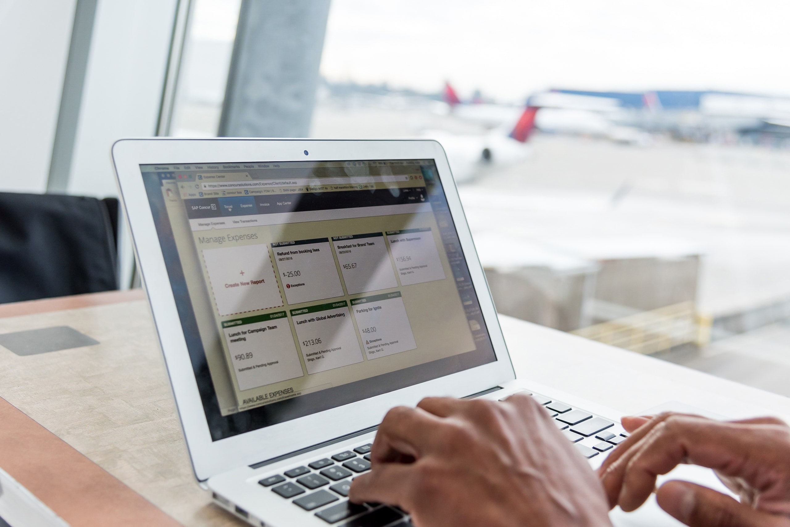 person typing on a laptop