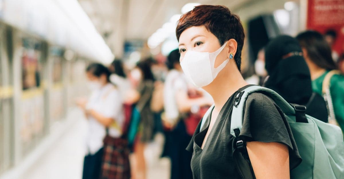 business woman waiting for the train