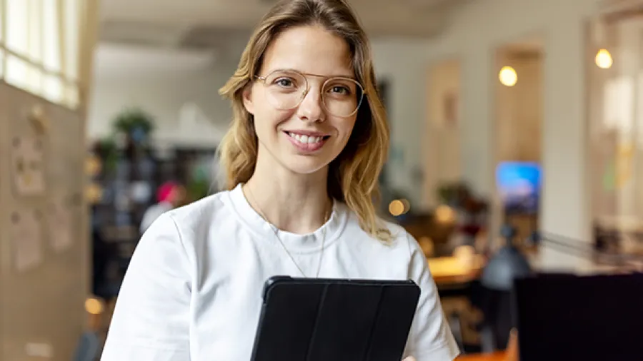 business professional holding tablet device
