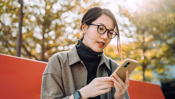 Woman working on phone