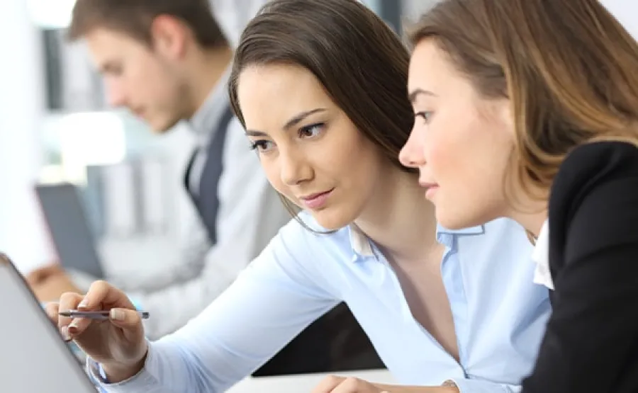 Woman pointing at screen