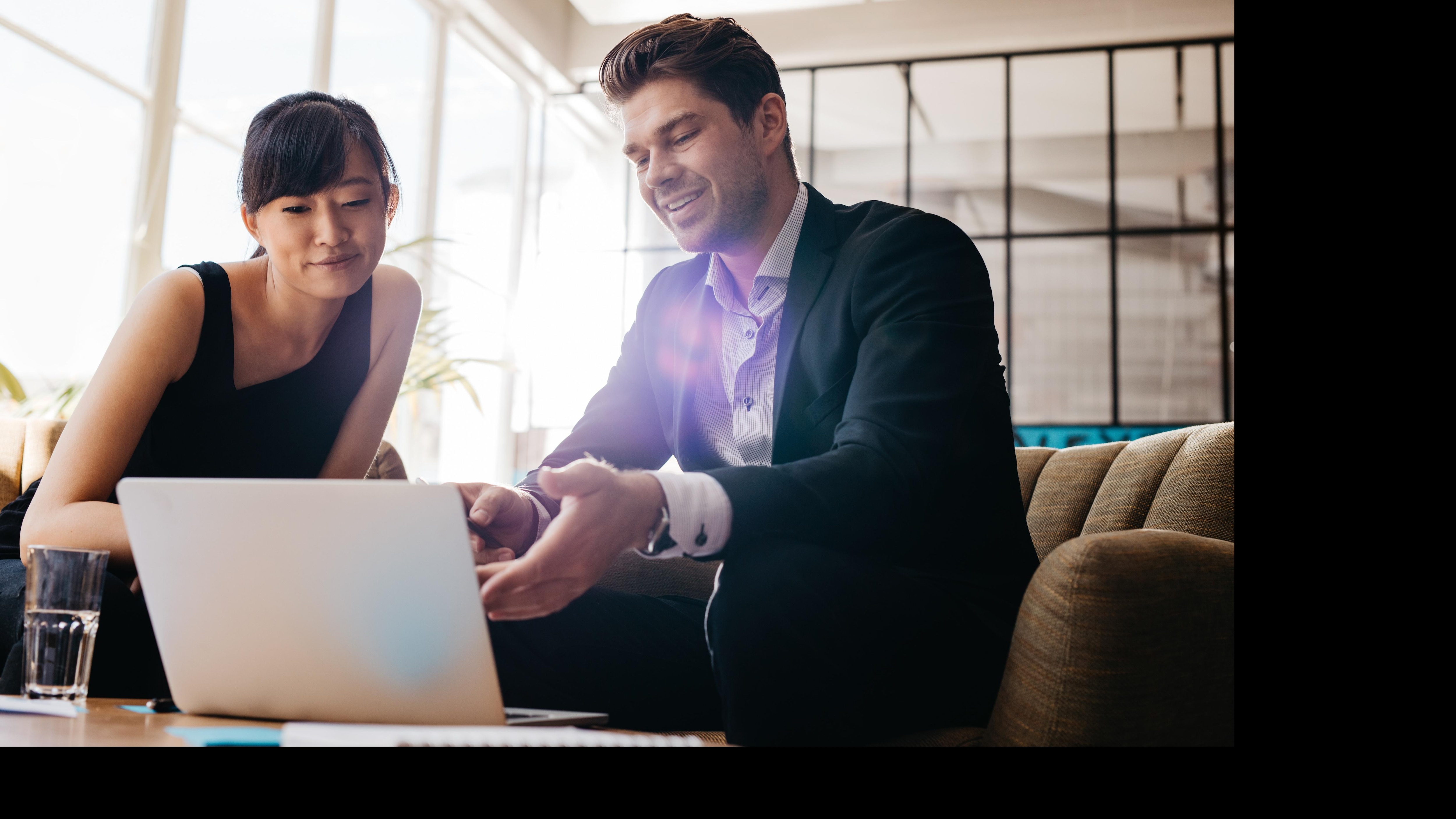 two happy workers in a meeting