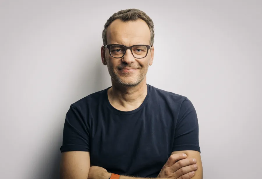 business professional with arms crossed in front