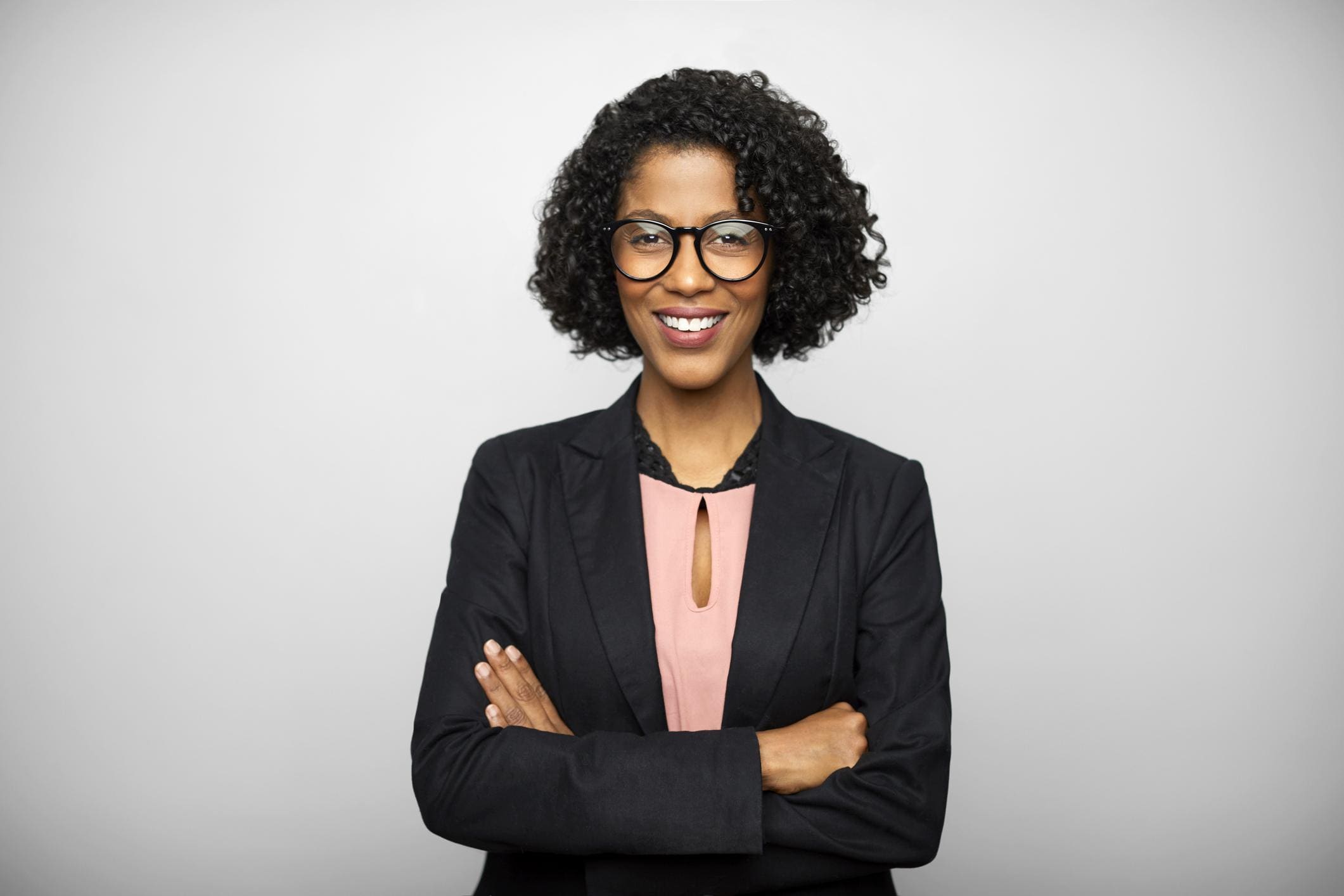 business professional with arms crossed in front