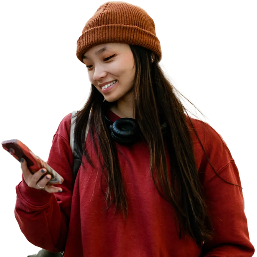 woman holding phone and smiling