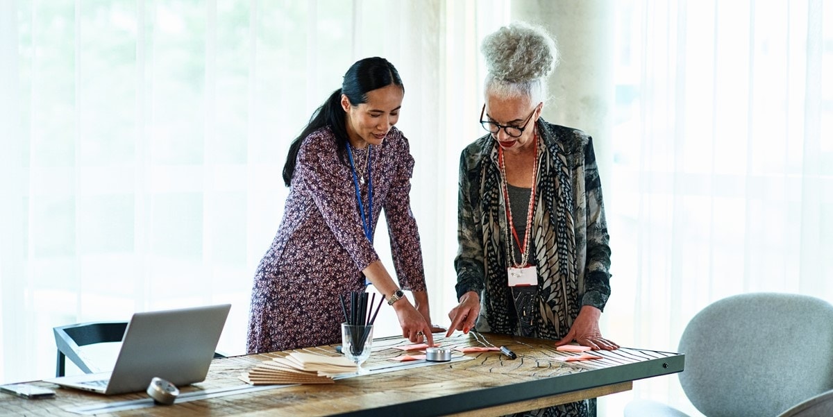 two women at an office table