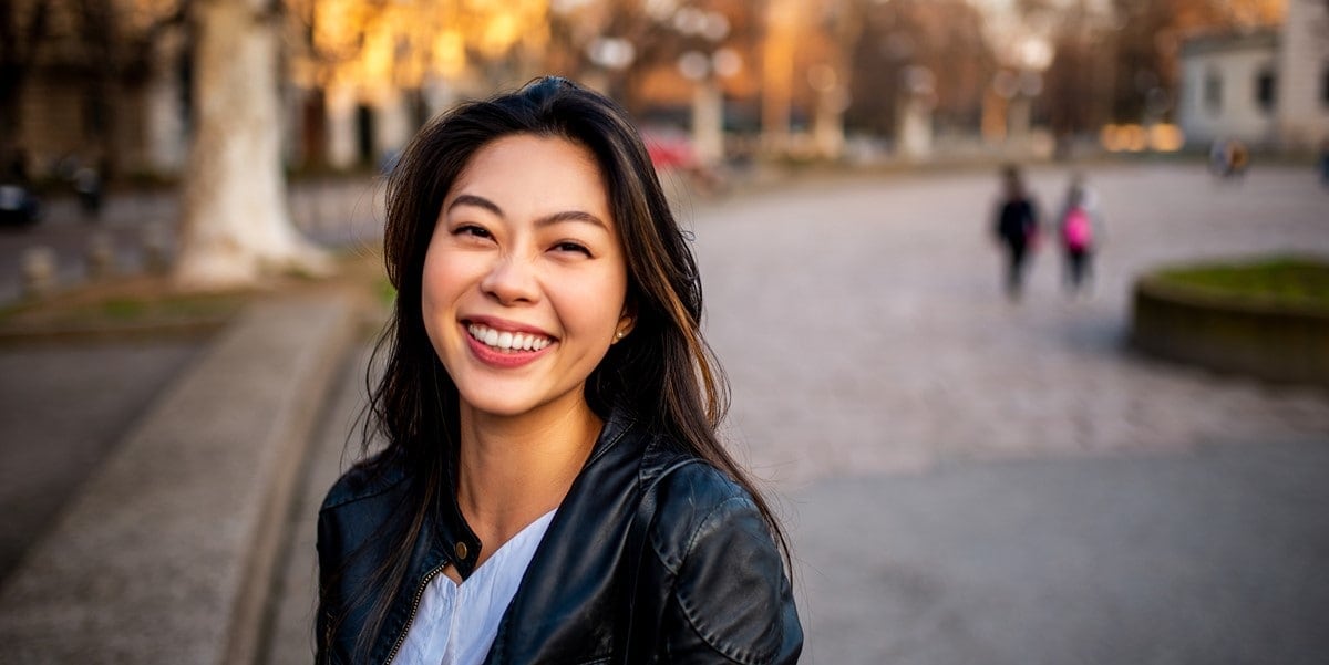woman smiling outside