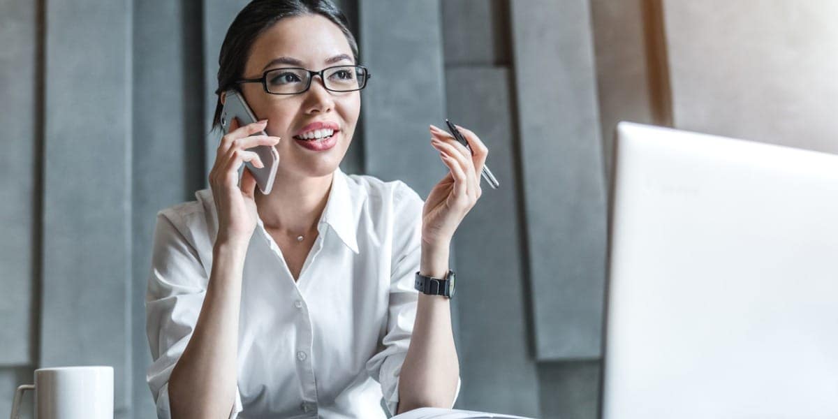 young woman working on a laptop